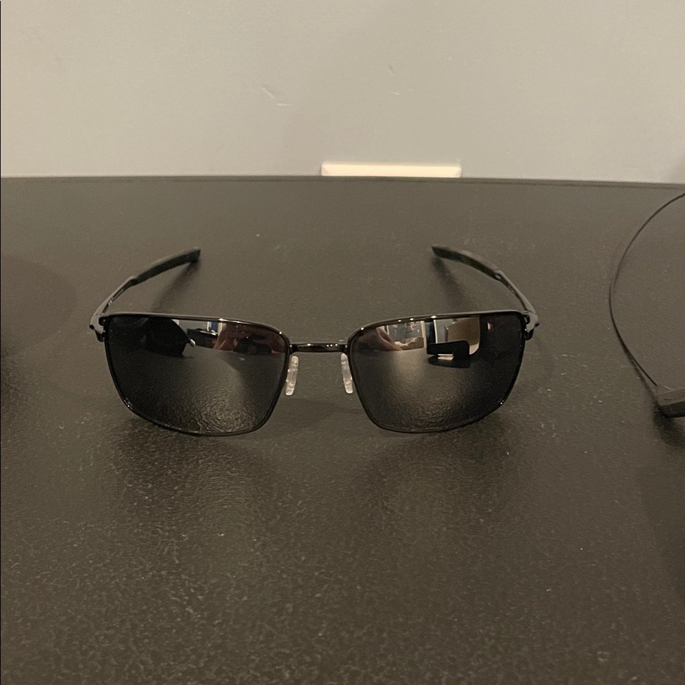 Oakley square wire sunglasses. Comes with all accessories. Worn 1 time.